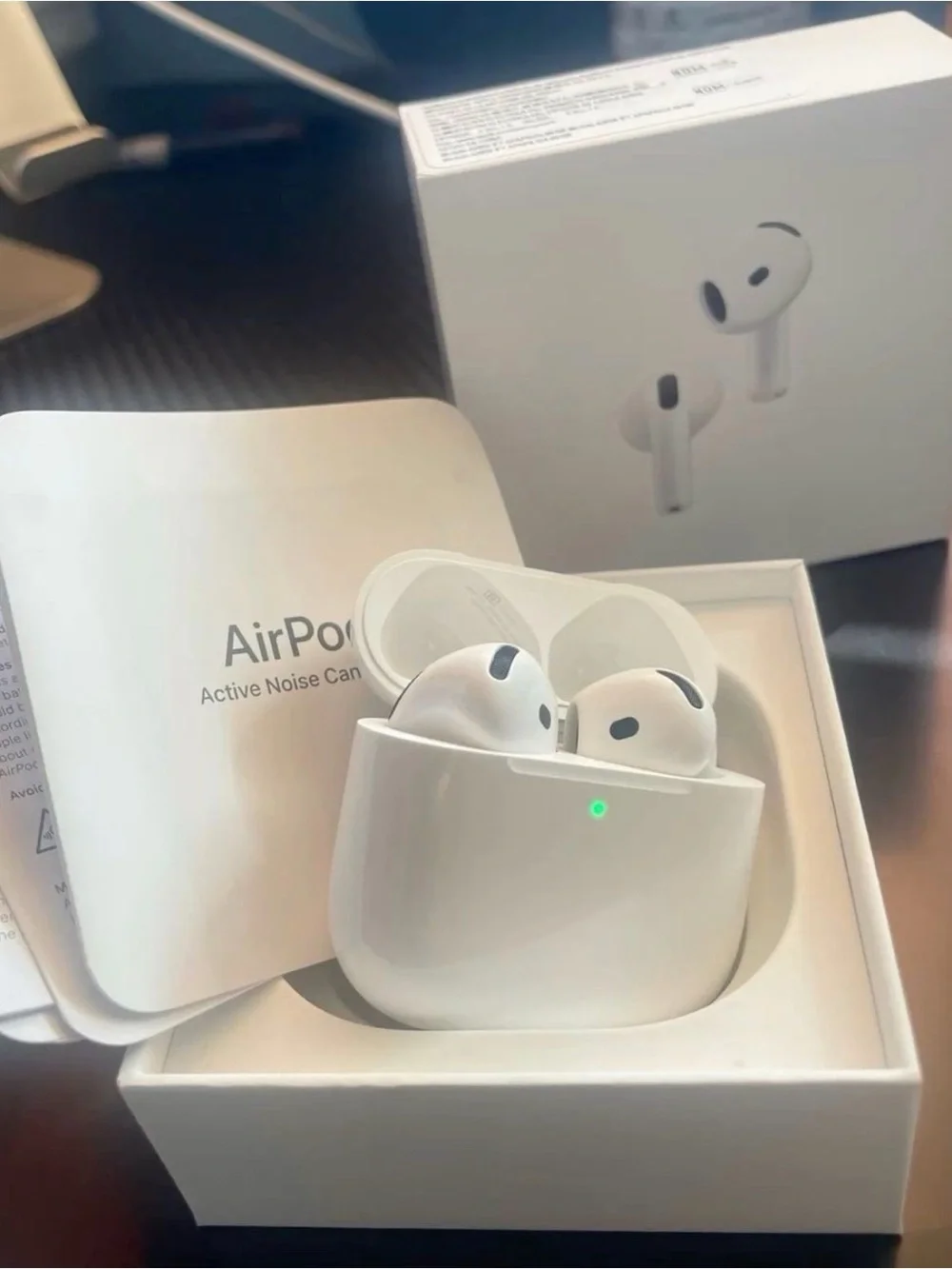 AirPods 4 with the option of Active Noise Cancellation. Powered by the H2 chip
